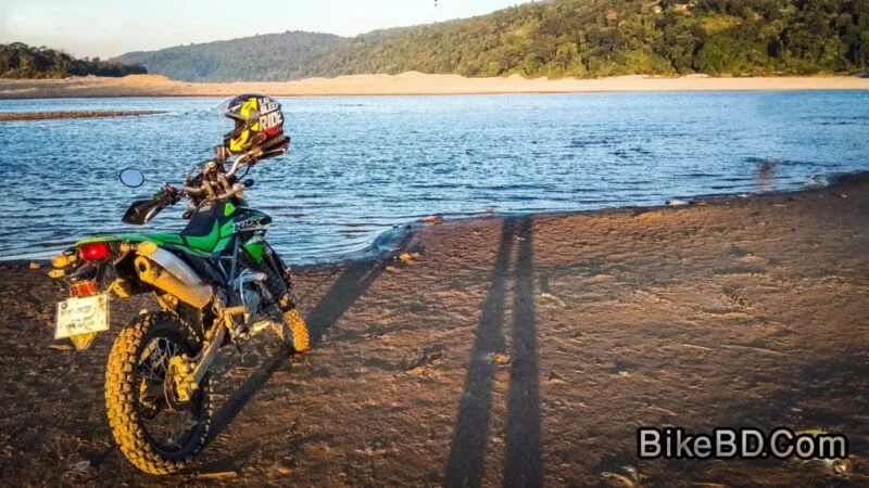 kawasaki klx 150bf besides a lake